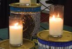 lit candles on pedestals