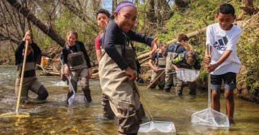 Koontz Intermediate School students at Cane Creek. Photo courtesy of RiverLink
